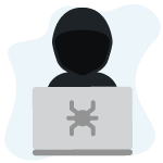 persoon in zwarte hoodie achter laptop